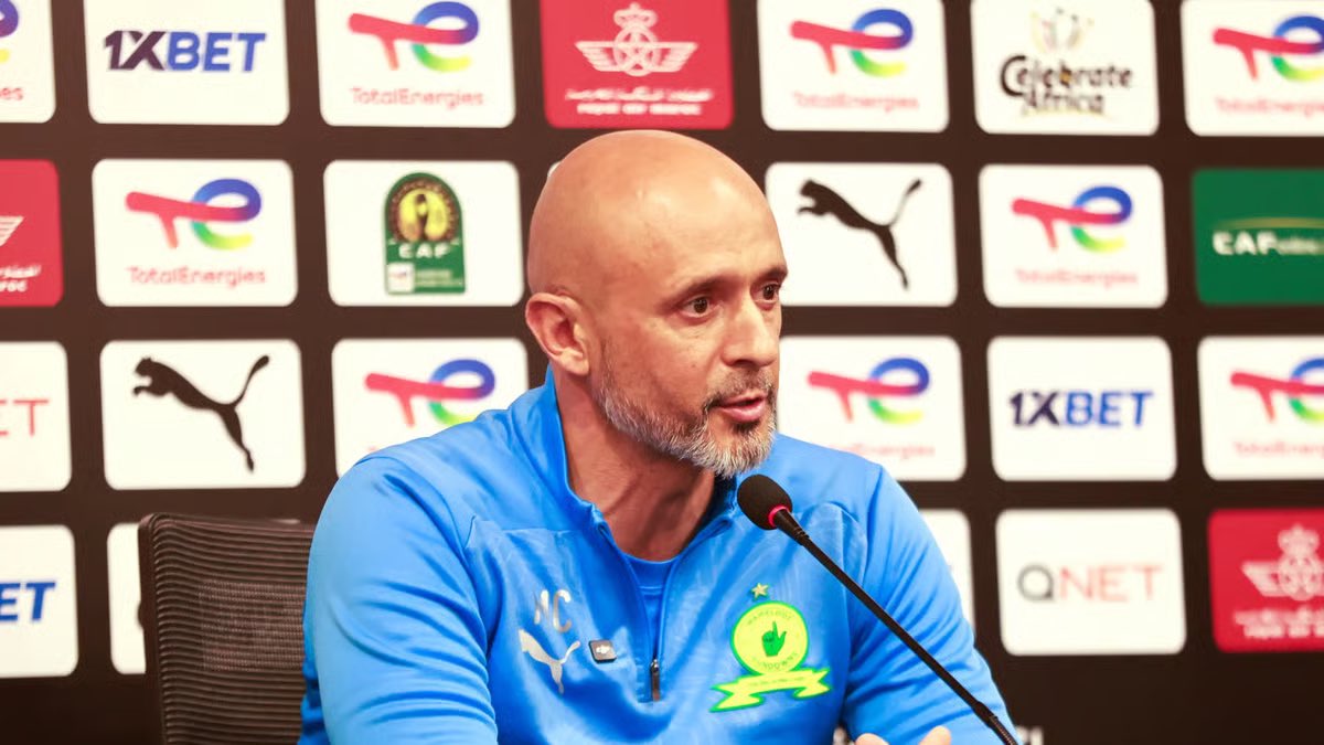Miguel Cardoso addressing the media before a CAF Champions League match.